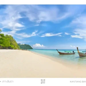 Tropical beach with longtail boats.